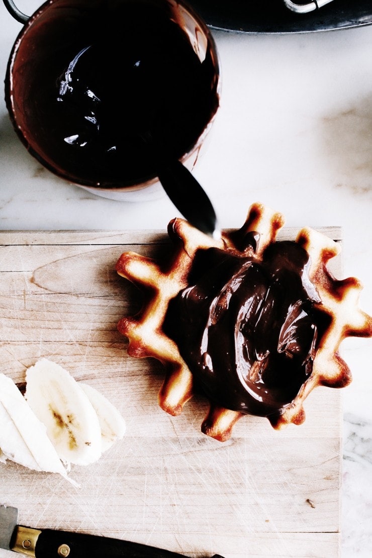 Crisp, golden, and sweet-smelling Belgian waffle recipe with a lighter-than-air center. So easy to make, they come together with just a few stirs! | sophisticatedgourmet.com