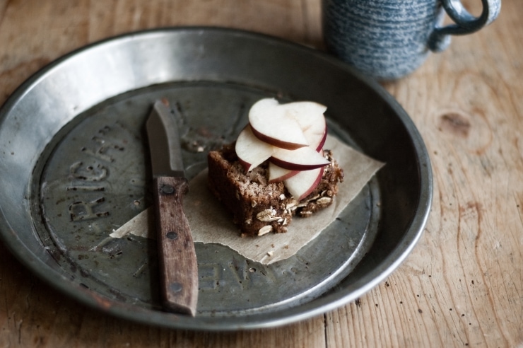 Apple Loaf Cake with apple slices and cup of coffee