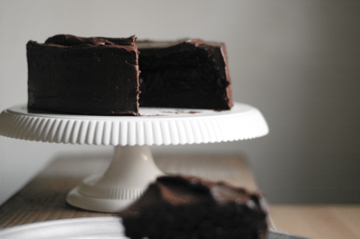 A moist and delicious strawberry and chocolate cake recipe with a decadent chocolate frosting. This chocolate layer cake is perfect for all celebrations! | sophisticatedgourmet.com