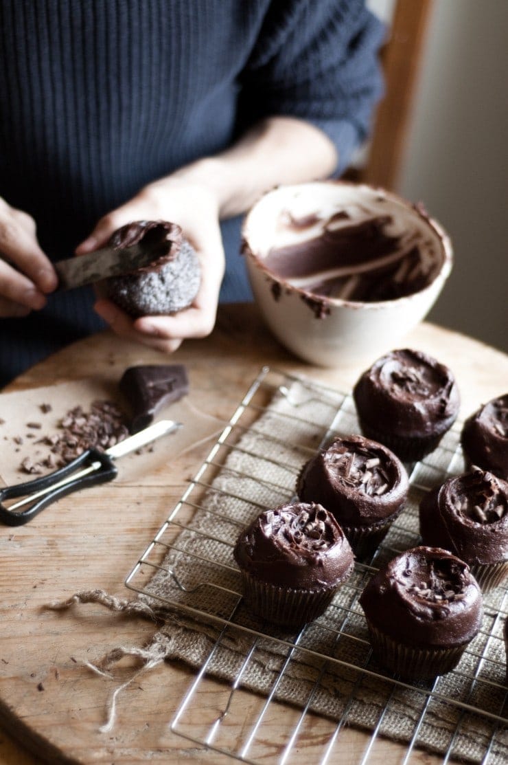 Decorating and frosting chocolate cupcakes