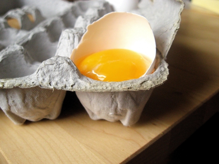 Broken egg in carton - Sophisticated Gourmet