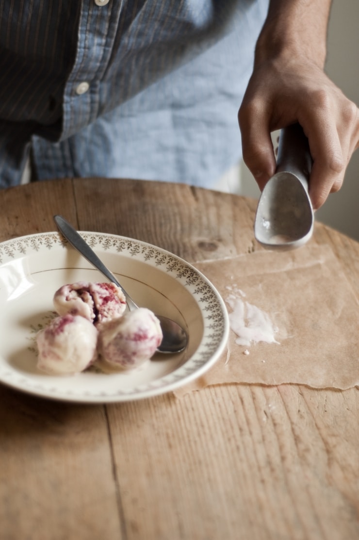 A delightful vanilla ice cream recipe swirled with homemade strawberry sauce. | sophisticatedgourmet.com