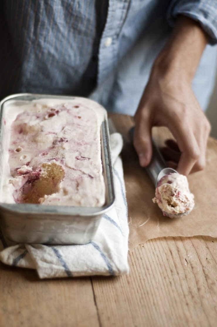 A delightful vanilla ice cream recipe swirled with homemade strawberry sauce. | sophisticatedgourmet.com