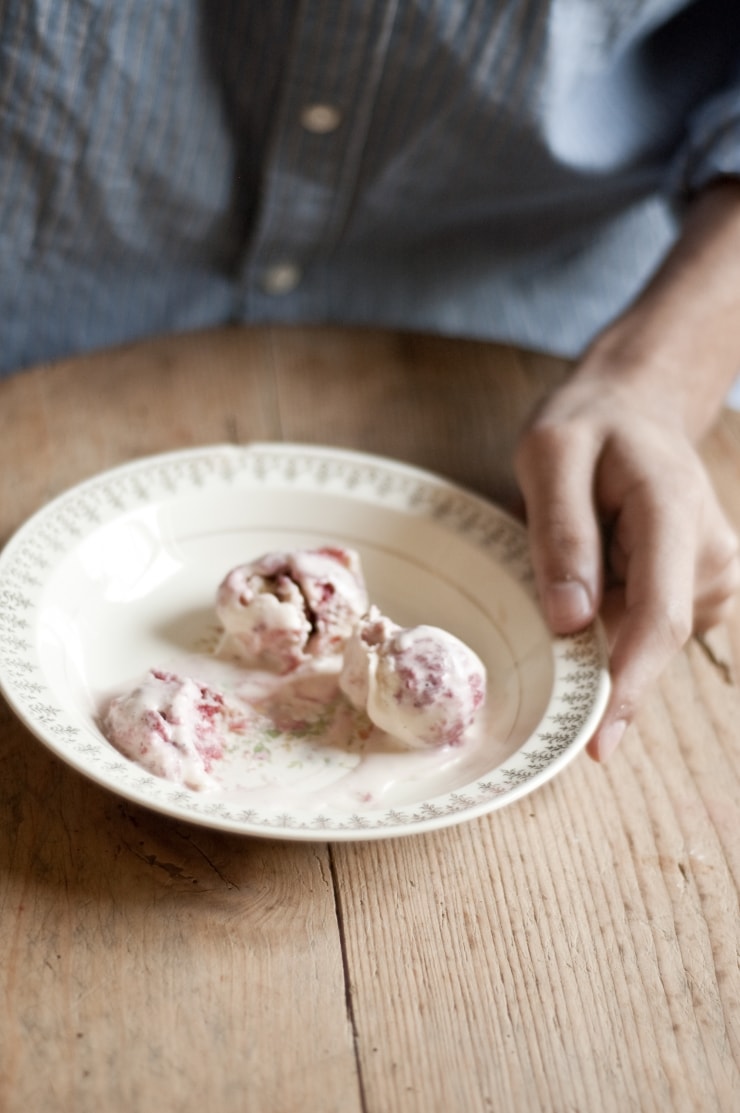 A delightful vanilla ice cream recipe swirled with homemade strawberry sauce. | sophisticatedgourmet.com