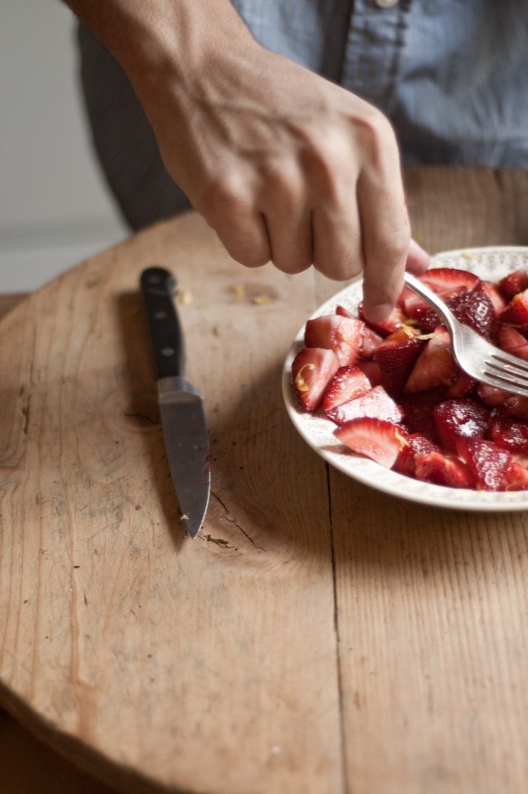 A delightful vanilla ice cream recipe swirled with homemade strawberry sauce. | sophisticatedgourmet.com