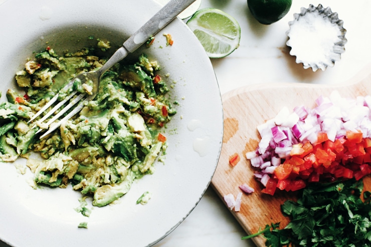 Guacamole is easy and comes together in no time. This guacamole recipe is no exception. It packs a lot of flavor and is perfect with chips and a drink. | sophisticatedgourmet.com