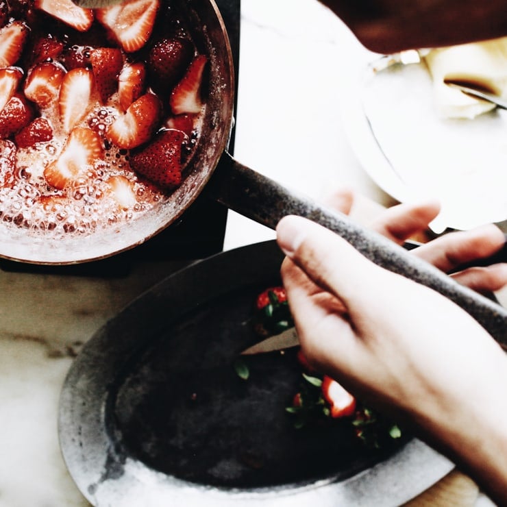 Strawberries cooking for jam