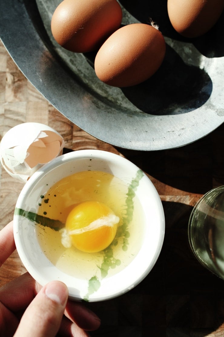 Crack egg into a small bowl