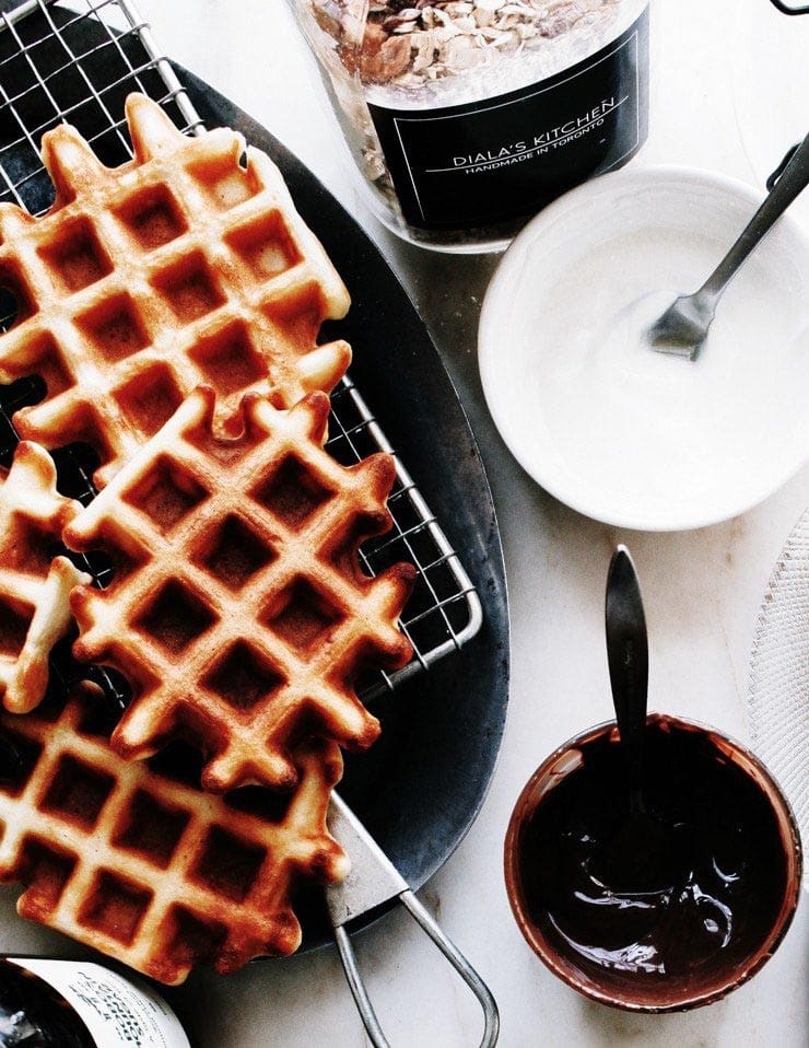 Waffles with Nutella, yogurt, and granola on the side